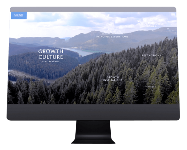 Bildschirm zeigt eine Gebirgslandschaft, Text: 'GROWTH CULTURE'.